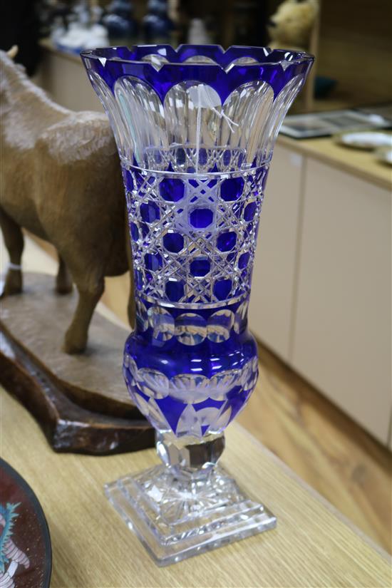 A large blue overlaid cut glass vase height 41cm